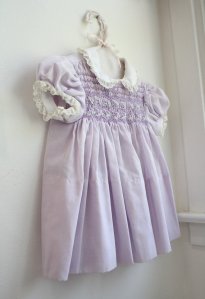 A classic Polly Flinders dress. I had one just like this, same color and all.